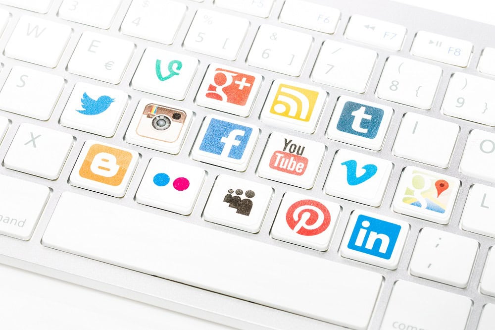 Social media logotype collection printed and placed on white com